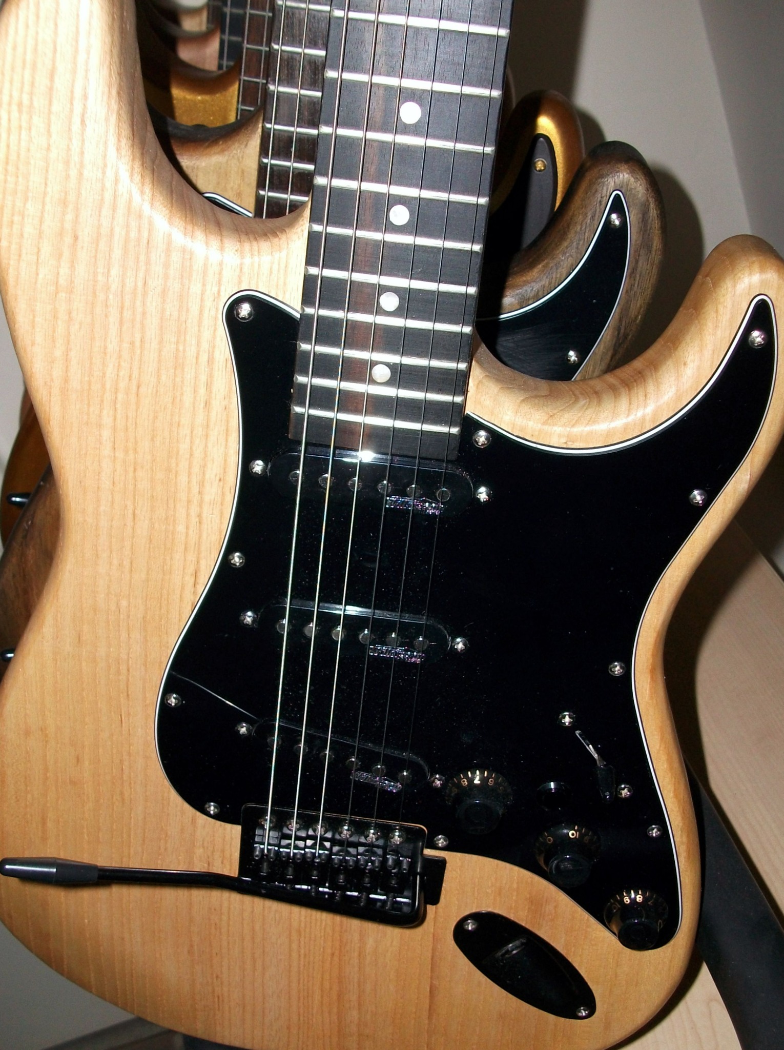 Electric guitar in a dark setting