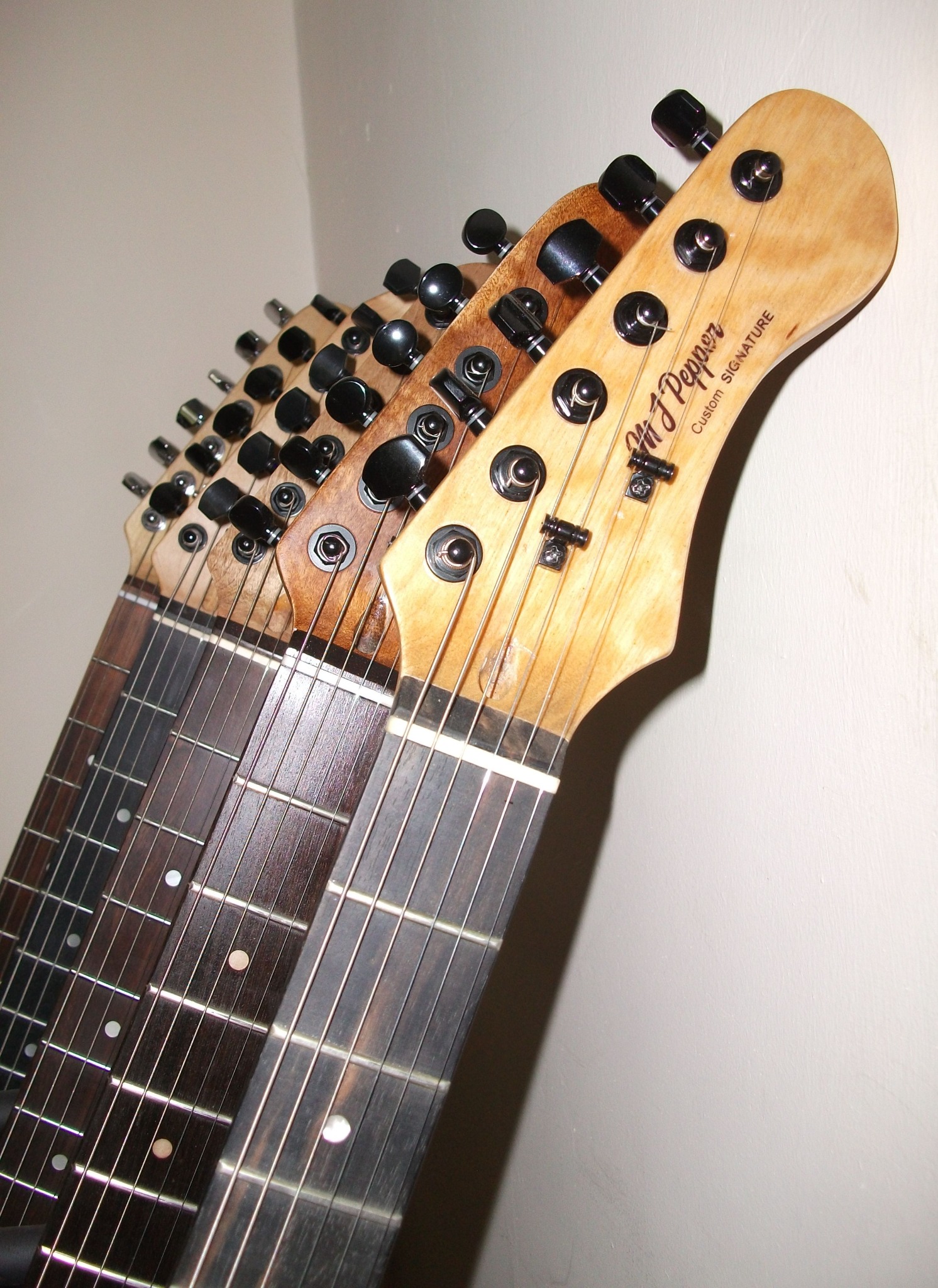 Electric guitar necks and headstocks